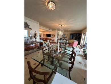 This beautifully classic 2-bedroom, 2-bathroom penthouse at the on Granada Golf Club in Florida - for sale on GolfHomes.com, golf home, golf lot