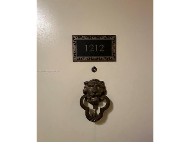 This beautifully classic 2-bedroom, 2-bathroom penthouse at the on Granada Golf Club in Florida - for sale on GolfHomes.com, golf home, golf lot