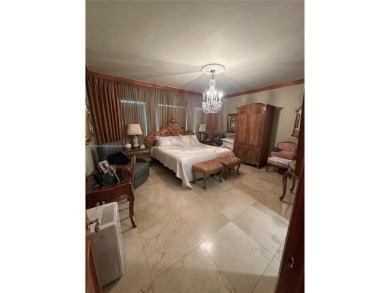 This beautifully classic 2-bedroom, 2-bathroom penthouse at the on Granada Golf Club in Florida - for sale on GolfHomes.com, golf home, golf lot
