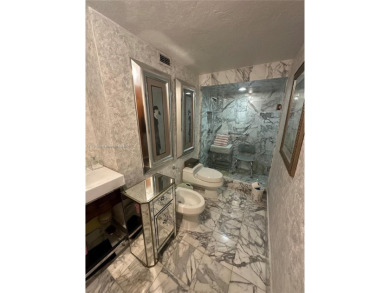 This beautifully classic 2-bedroom, 2-bathroom penthouse at the on Granada Golf Club in Florida - for sale on GolfHomes.com, golf home, golf lot