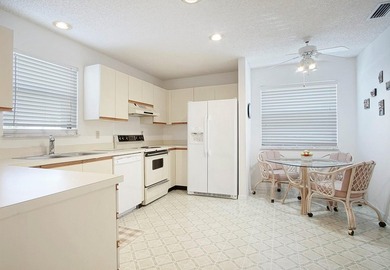 Brand-new roofs coming soon - no assessment! Enjoy stunning lake on Miles Grant Country Club in Florida - for sale on GolfHomes.com, golf home, golf lot