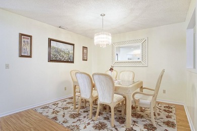 Brand-new roofs coming soon - no assessment! Enjoy stunning lake on Miles Grant Country Club in Florida - for sale on GolfHomes.com, golf home, golf lot