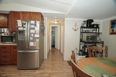 Discover tranquility in this fully furnished 3-bedroom, 2-bath on Prestwick Country Club in South Carolina - for sale on GolfHomes.com, golf home, golf lot