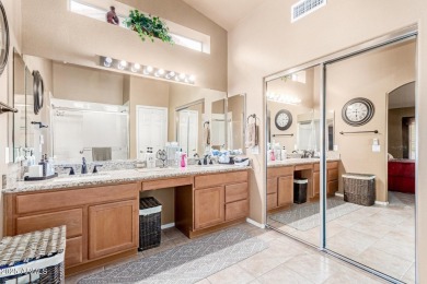 Beautiful landscaping greets you into this popular Palmera model on Oakwood Golf Club  in Arizona - for sale on GolfHomes.com, golf home, golf lot