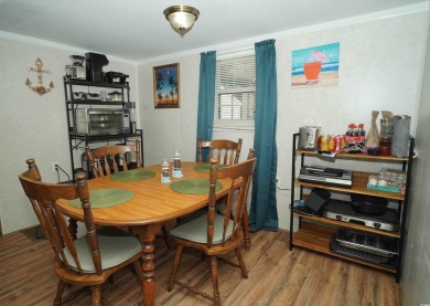 Discover tranquility in this fully furnished 3-bedroom, 2-bath on Prestwick Country Club in South Carolina - for sale on GolfHomes.com, golf home, golf lot