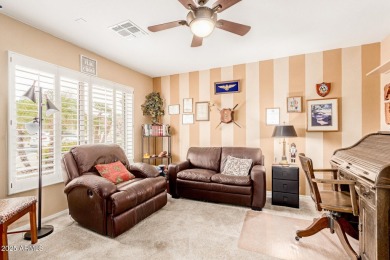 Beautiful landscaping greets you into this popular Palmera model on Oakwood Golf Club  in Arizona - for sale on GolfHomes.com, golf home, golf lot
