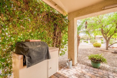 Beautiful landscaping greets you into this popular Palmera model on Oakwood Golf Club  in Arizona - for sale on GolfHomes.com, golf home, golf lot