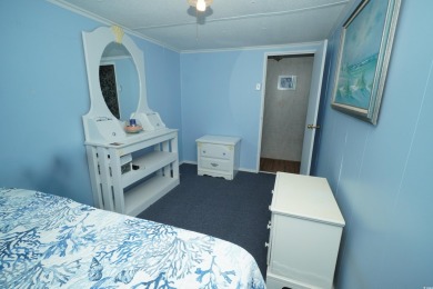 Discover tranquility in this fully furnished 3-bedroom, 2-bath on Prestwick Country Club in South Carolina - for sale on GolfHomes.com, golf home, golf lot