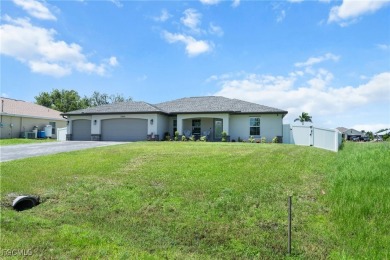 Skip the wait and the builder-grade finishes-this 2022 Cape on Burnt Store Golf Club in Florida - for sale on GolfHomes.com, golf home, golf lot