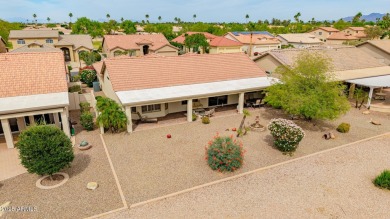Beautiful landscaping greets you into this popular Palmera model on Oakwood Golf Club  in Arizona - for sale on GolfHomes.com, golf home, golf lot