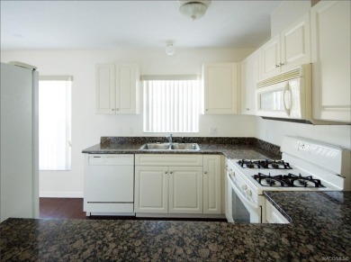Town Home with 3 bedrooms and 2 bathrooms, convenient located on LakeSide Country Club in Florida - for sale on GolfHomes.com, golf home, golf lot