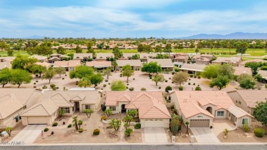 Beautiful landscaping greets you into this popular Palmera model on Oakwood Golf Club  in Arizona - for sale on GolfHomes.com, golf home, golf lot