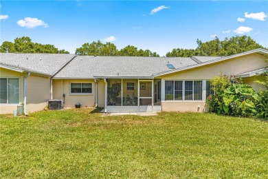 This charming, freshly painted Philadelphia home is nestled in on On Top of the World Golf Course in Florida - for sale on GolfHomes.com, golf home, golf lot