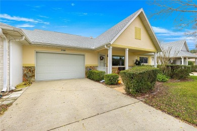 This charming, freshly painted Philadelphia home is nestled in on On Top of the World Golf Course in Florida - for sale on GolfHomes.com, golf home, golf lot