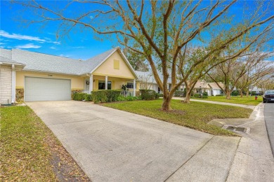 This charming, freshly painted Philadelphia home is nestled in on On Top of the World Golf Course in Florida - for sale on GolfHomes.com, golf home, golf lot