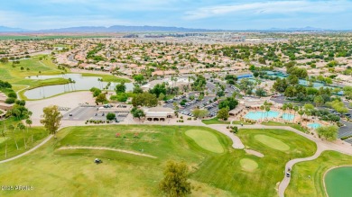 Beautiful landscaping greets you into this popular Palmera model on Oakwood Golf Club  in Arizona - for sale on GolfHomes.com, golf home, golf lot