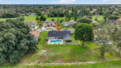 Beautifully upgraded 4 bedroom estate pool home on a quiet on  in Florida - for sale on GolfHomes.com, golf home, golf lot