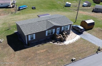 Welcome to this beautifully maintained 3-bedroom, 2-bath home on Woodlake Golf Club in Tennessee - for sale on GolfHomes.com, golf home, golf lot