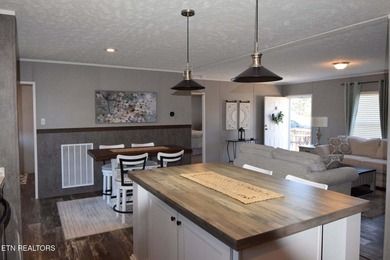 Welcome to this beautifully maintained 3-bedroom, 2-bath home on Woodlake Golf Club in Tennessee - for sale on GolfHomes.com, golf home, golf lot