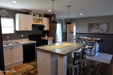 Welcome to this beautifully maintained 3-bedroom, 2-bath home on Woodlake Golf Club in Tennessee - for sale on GolfHomes.com, golf home, golf lot