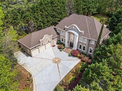 Welcome to an extraordinary six-bedroom, seven full and two on The Golf Club of Georgia in Georgia - for sale on GolfHomes.com, golf home, golf lot