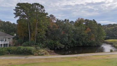 This exceptional half-acre lot offers stunning views of the on The Seabrook Island Club in South Carolina - for sale on GolfHomes.com, golf home, golf lot