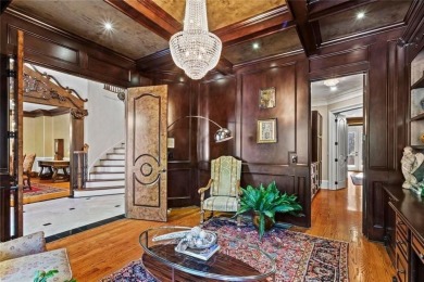 Welcome to an extraordinary six-bedroom, seven full and two on The Golf Club of Georgia in Georgia - for sale on GolfHomes.com, golf home, golf lot