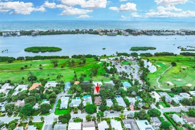 Welcome to your cozy coastal retreat in Lake Worth, just a block on Lake Worth Municipal Golf Course in Florida - for sale on GolfHomes.com, golf home, golf lot