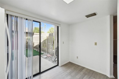 Welcome home! This 2-bedroom, 2.5-bath townhome is nestled in on East Lake Woodlands Country Club in Florida - for sale on GolfHomes.com, golf home, golf lot