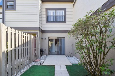 Welcome home! This 2-bedroom, 2.5-bath townhome is nestled in on East Lake Woodlands Country Club in Florida - for sale on GolfHomes.com, golf home, golf lot