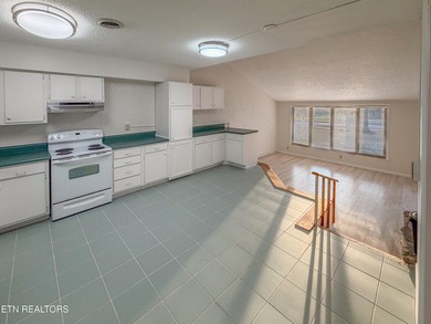 Charming 1,762 sq. ft., 2 bedroom, 3 bath condo ideally located on Lake Tansi Village Country Club in Tennessee - for sale on GolfHomes.com, golf home, golf lot