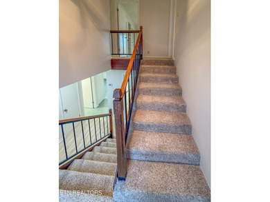 Charming 1,762 sq. ft., 2 bedroom, 3 bath condo ideally located on Lake Tansi Village Country Club in Tennessee - for sale on GolfHomes.com, golf home, golf lot