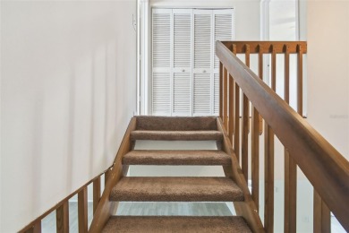 Welcome home! This 2-bedroom, 2.5-bath townhome is nestled in on East Lake Woodlands Country Club in Florida - for sale on GolfHomes.com, golf home, golf lot