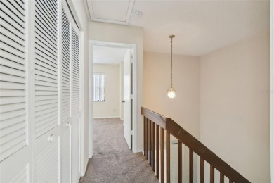 Welcome home! This 2-bedroom, 2.5-bath townhome is nestled in on East Lake Woodlands Country Club in Florida - for sale on GolfHomes.com, golf home, golf lot