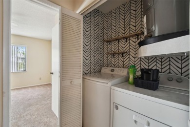 Welcome home! This 2-bedroom, 2.5-bath townhome is nestled in on East Lake Woodlands Country Club in Florida - for sale on GolfHomes.com, golf home, golf lot