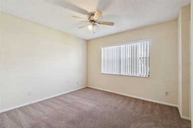 Welcome home! This 2-bedroom, 2.5-bath townhome is nestled in on East Lake Woodlands Country Club in Florida - for sale on GolfHomes.com, golf home, golf lot