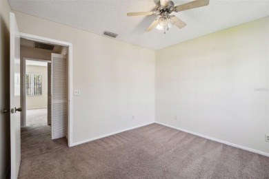Welcome home! This 2-bedroom, 2.5-bath townhome is nestled in on East Lake Woodlands Country Club in Florida - for sale on GolfHomes.com, golf home, golf lot