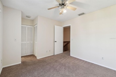 Welcome home! This 2-bedroom, 2.5-bath townhome is nestled in on East Lake Woodlands Country Club in Florida - for sale on GolfHomes.com, golf home, golf lot