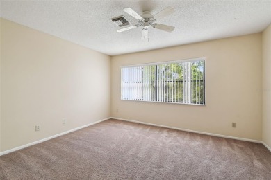 Welcome home! This 2-bedroom, 2.5-bath townhome is nestled in on East Lake Woodlands Country Club in Florida - for sale on GolfHomes.com, golf home, golf lot
