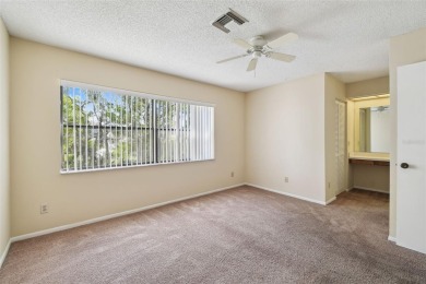 Welcome home! This 2-bedroom, 2.5-bath townhome is nestled in on East Lake Woodlands Country Club in Florida - for sale on GolfHomes.com, golf home, golf lot