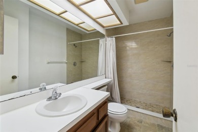 Welcome home! This 2-bedroom, 2.5-bath townhome is nestled in on East Lake Woodlands Country Club in Florida - for sale on GolfHomes.com, golf home, golf lot