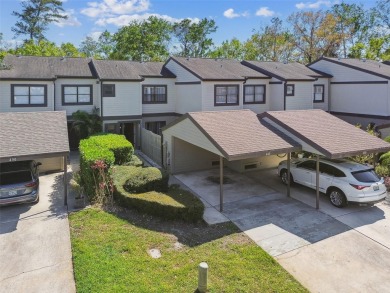 Welcome home! This 2-bedroom, 2.5-bath townhome is nestled in on East Lake Woodlands Country Club in Florida - for sale on GolfHomes.com, golf home, golf lot