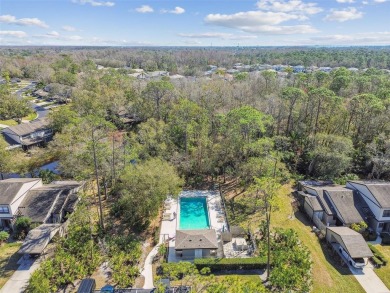 Welcome home! This 2-bedroom, 2.5-bath townhome is nestled in on East Lake Woodlands Country Club in Florida - for sale on GolfHomes.com, golf home, golf lot