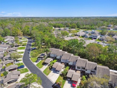Welcome home! This 2-bedroom, 2.5-bath townhome is nestled in on East Lake Woodlands Country Club in Florida - for sale on GolfHomes.com, golf home, golf lot