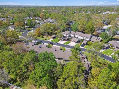 Welcome home! This 2-bedroom, 2.5-bath townhome is nestled in on East Lake Woodlands Country Club in Florida - for sale on GolfHomes.com, golf home, golf lot