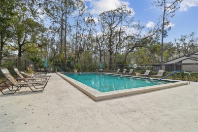 Welcome home! This 2-bedroom, 2.5-bath townhome is nestled in on East Lake Woodlands Country Club in Florida - for sale on GolfHomes.com, golf home, golf lot
