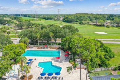 Welcome home! This 2-bedroom, 2.5-bath townhome is nestled in on East Lake Woodlands Country Club in Florida - for sale on GolfHomes.com, golf home, golf lot