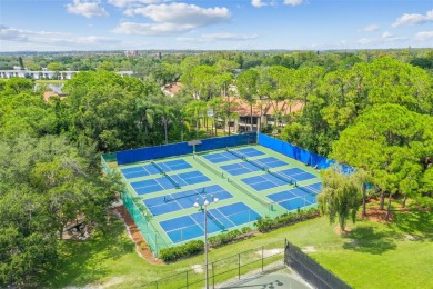 Welcome home! This 2-bedroom, 2.5-bath townhome is nestled in on East Lake Woodlands Country Club in Florida - for sale on GolfHomes.com, golf home, golf lot