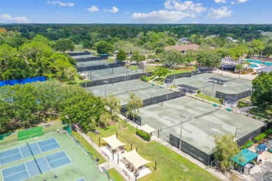 Welcome home! This 2-bedroom, 2.5-bath townhome is nestled in on East Lake Woodlands Country Club in Florida - for sale on GolfHomes.com, golf home, golf lot