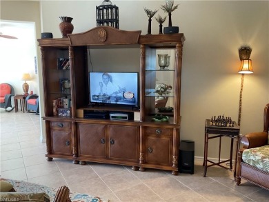 GOLF INCLUDED, second floor end unit Carriage Home with 2,045 on Colonial Country Club in Florida - for sale on GolfHomes.com, golf home, golf lot